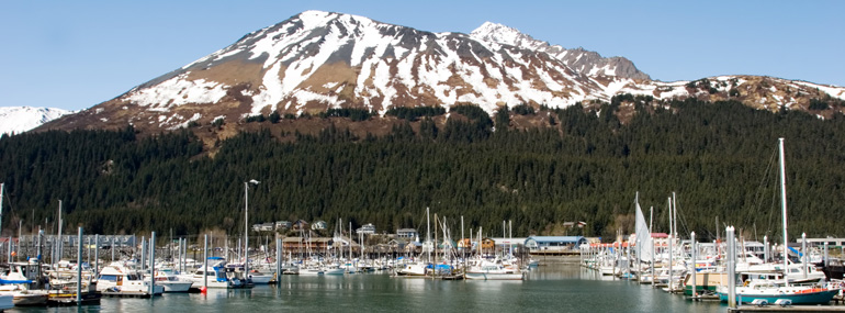 Which of these Alaskan port cities is accessible by car?
