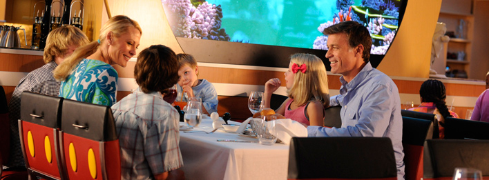At which Disney restaurant can cruisers be treated to both dinner and a show?