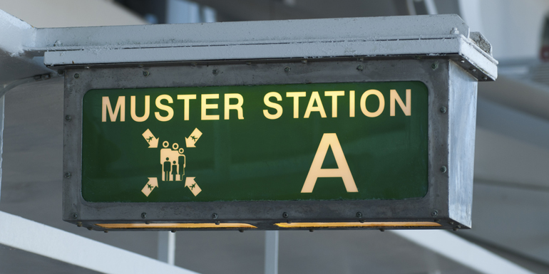 muster station cruise ship sign