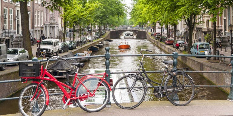 bicycles bridge canal amsterdam netherlands activities